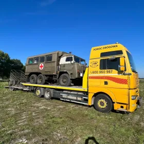 Transport wózków widłowych maszyn koparek Poznan